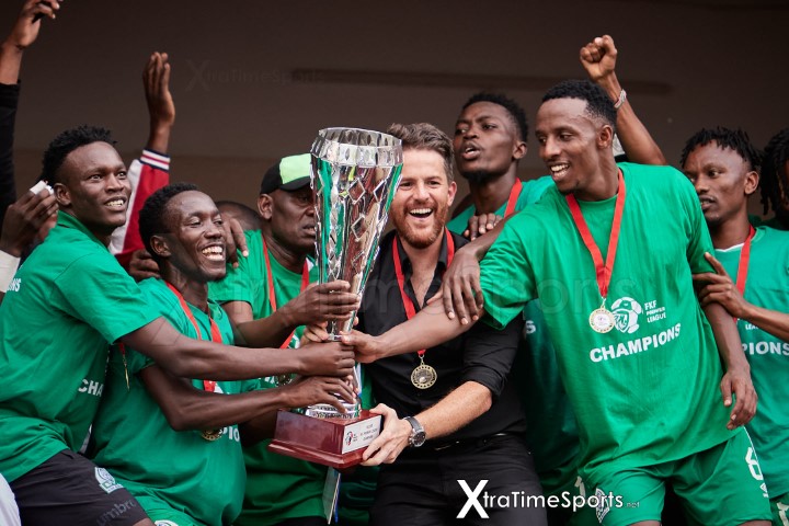 Nairobi, Kenya. 25 Jun 2023.  Johnathan MCKINSTRY (Head Coach, Gor Mahia) and players lift the trophy for winning the League title. Credit: XtraTimeSports (Darren McKinstry)