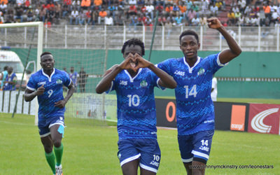 Kei Kamara celebrates his goal ' heart shaped hands' ...[Leone Stars v Ivory Coast, 6 September 2014 (Pic © Darren McKinstry / www.johnnymckinstry.com)]